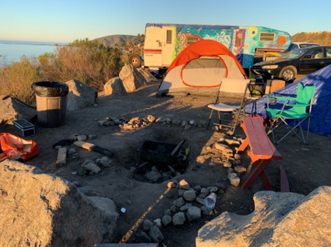 An encampment has developed at Cave Landing, where residents have dug fire pits, created makeshift toilets, set up tents and parked RVs and vans on land that’s significant to local Native American tribes.