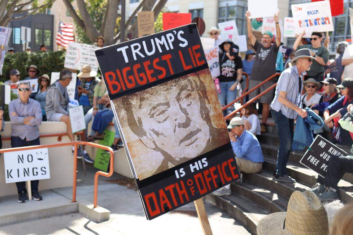 Protestors gathered in front of the courthouse in San Luis Obispo, for No Kings Day to protest executive overreach by the Trump administration on the president’s birthday.