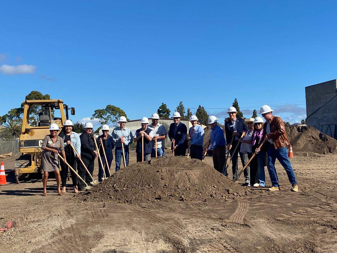 Members of the 5Cities Homeless Coalition, Grover Beach City Council and administration, and the San Luis Obispo County Board of Supervisors celebrate the start of construction of a non-congregate homeless shelter in Grover Beach on Monday, Nov. 6, 2023.