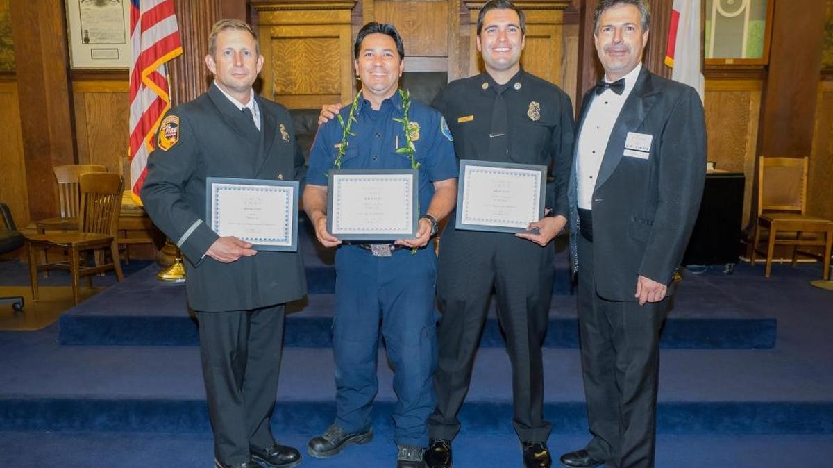 Local firefighters Capt. Mike DeLeo, left, Brandon Kato and William Nason were recently honored by King David's Masonic Lodge. Master Robert Bettencourt, right, presented them with Certificates of Appreciation at a banquet held in their honor.