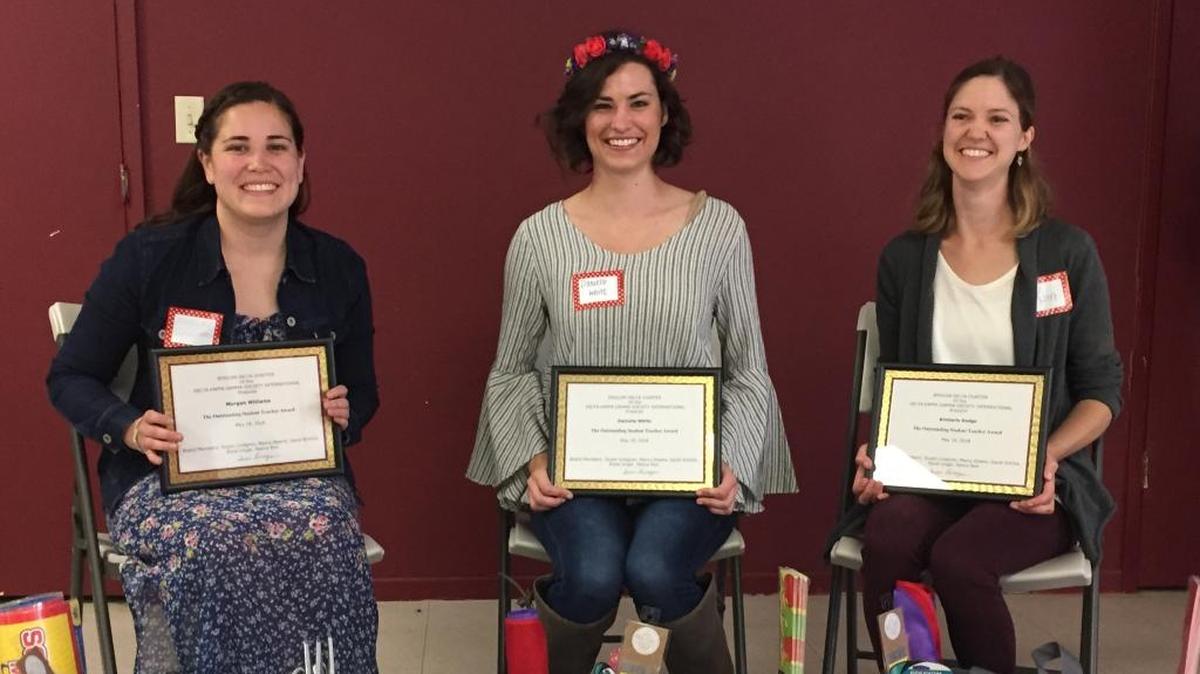 From left, Cal Poly student teachers Morgan Williams, Danielle White and Kimberly Dodge recently received $375 each and a basket of teaching supplies for their new classrooms from Delta Kappa Gamma International.