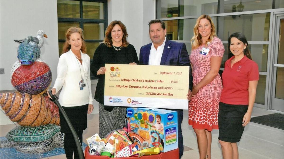 From left, Jaynie Wood, child life specialist; Geri LaChance, SESLOC FCU president/CEO; Jeff York, CoastHills president/CEO; Jennifer Wobig, service line director, children’s services; and Ann Peyrat, Children’s Miracle Network gift officer present the donation to Cottage Children’s Medical Center in Santa Barbara.