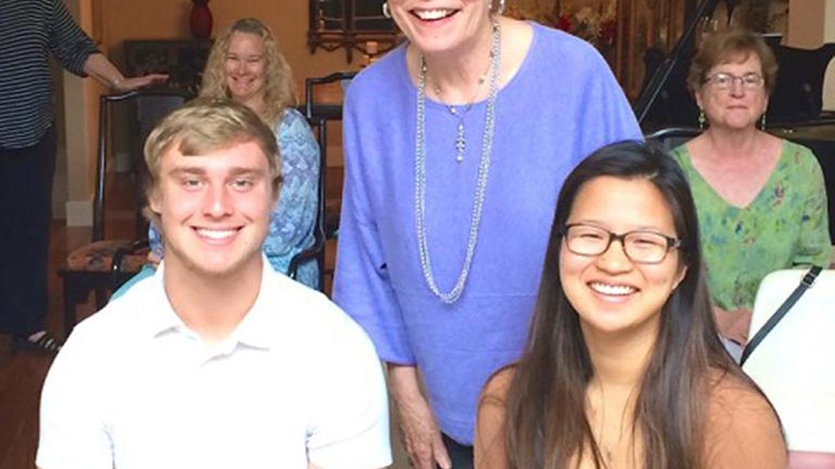 Recent Coast Union High School graduates Lane Sutherland, left, and Xue Dimaggio, right, recently received scholarships of $900 each from the Cambria Garden Club. Club President Leanne Snodgrass, center, is pictured with them.