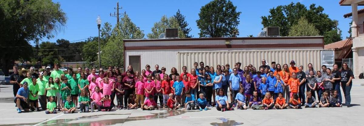 North County Christian School students gather for a photo during the school’s 2016 Service Day, when they planted fruits and vegetables and made Blessing Bags for the homeless in Atascadero.