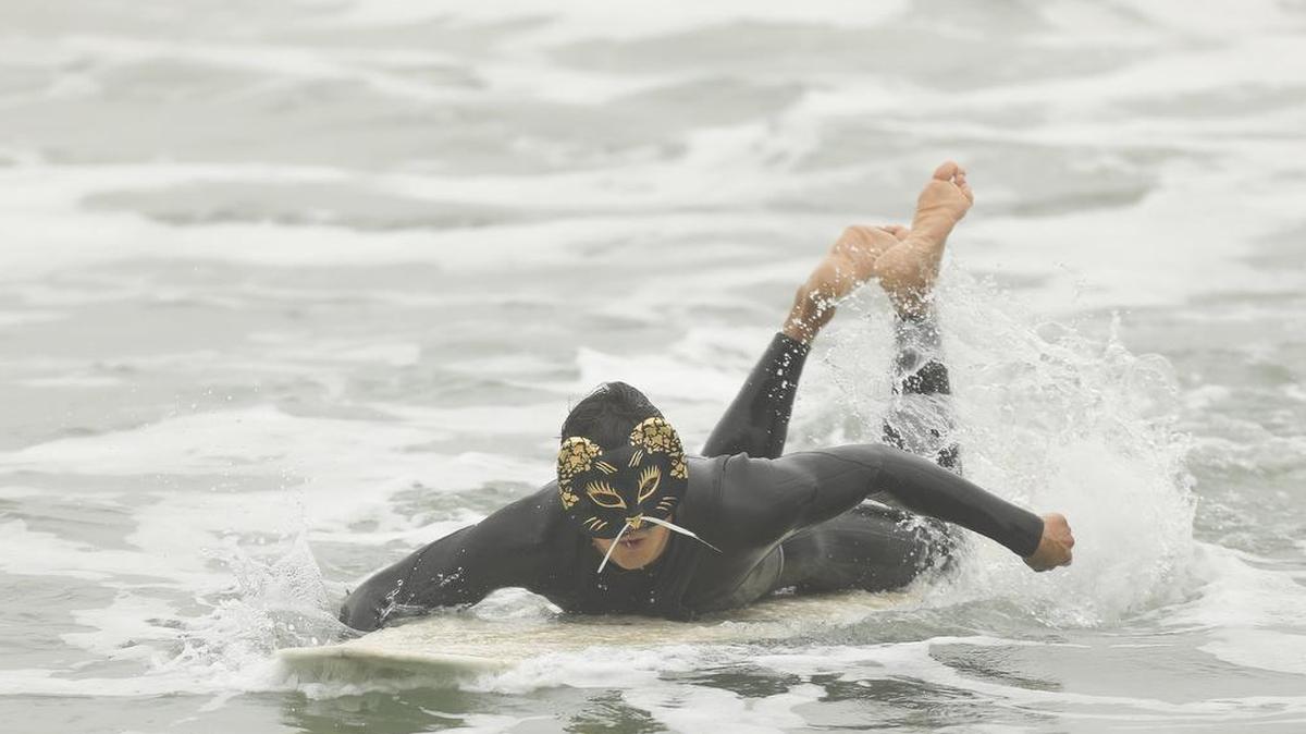 The Haoleween Surf Competition returns for its third year Sunday morning at Morro Rock. Here, Willie Gonzalez of Morro Bay surfs in last year’s event.