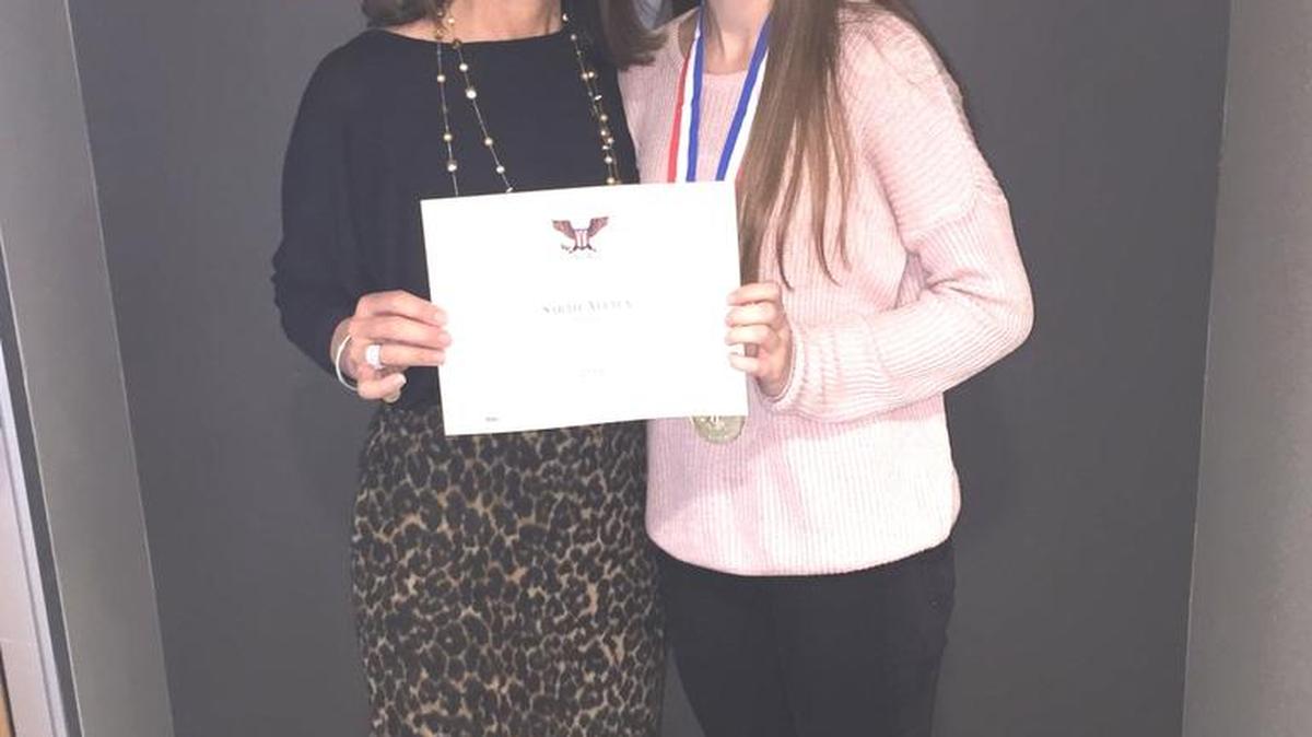 Sarah Attala, right, was awarded a gold President’s Volunteer Service Award. She is pictured with Jack’s Helping Hand co-founder Bridget Ready.
