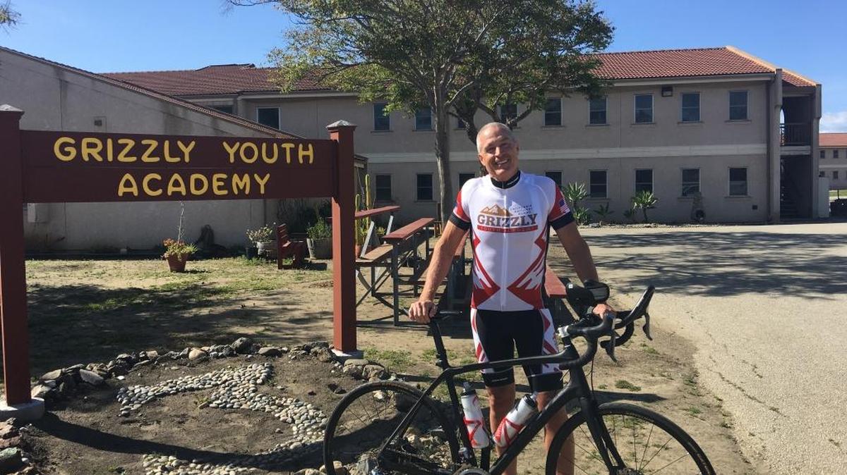 Gregg Westerbeck is on a 3,100-mile bicycle trip to raise scholarship funds for the Grizzly Youth Academy.