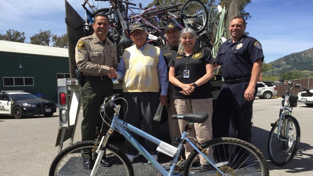 Don Morris, second from left, donated 85 bicycles to the Sheriff’s Office bicycle program. Pictured with him, from left, are Sheriff Ian Parkinson, Sam Scarbrough and Mary Scarbrough of the Sheriff’s Advisory Foundation and George Hughes, Cal Poly University police chief.