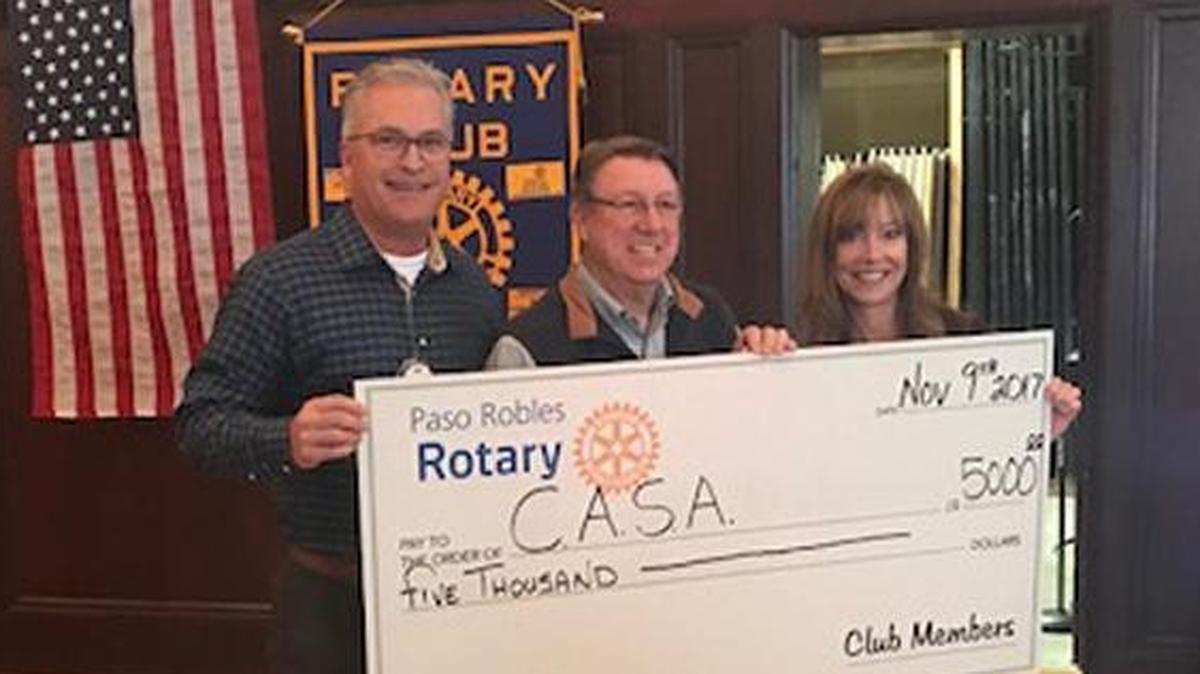 Court Appointed Special Advocates for children (CASA) recently received a $5,000 donation from the Paso Robles Rotary Club. From left are Rick Goree, Tom Dobyns of CASA and Julie Richardson Kreowski.