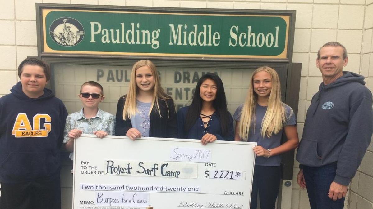 Paulding Middle School students recently raised money for Project Surf Camp during their Burpees for a Cause fundraiser.
