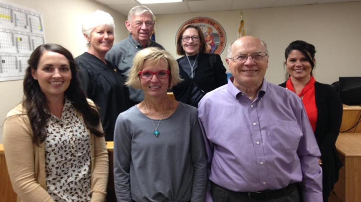 Juvenile Court Judge Linda Hurst, back row, far left, recently swore in new officers of the court for CASA. The new volunteers include, from left, front row, Lisa Hamon, Sue Gatlin, Greg Thomas; back row, Lisa Hamon, Sue Gatlin and Greg Thomas.