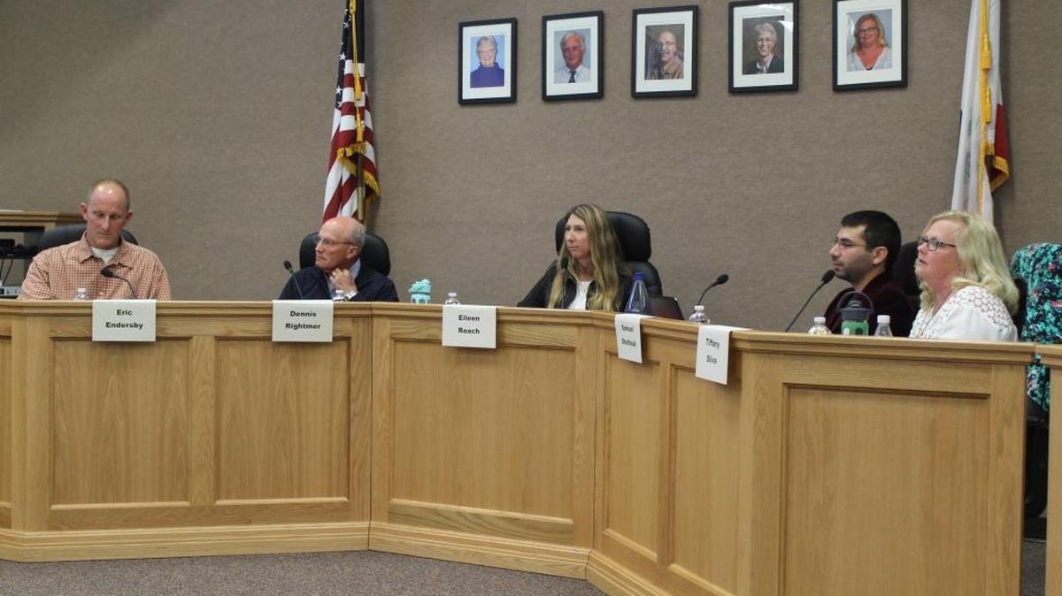 The five candidates seeking a four-year seat on the Coast Unified School District board prepare to participate in a forum Oct. 19 at the district board room. From left, Eric Endersby, Dennis Rightmer, Eileen Roach, Samuel Shalhoub and appointed incumbent Tiffany Silva. Not pictured is appointed incumbent Lee McFarland, who is seeking a two-year term.