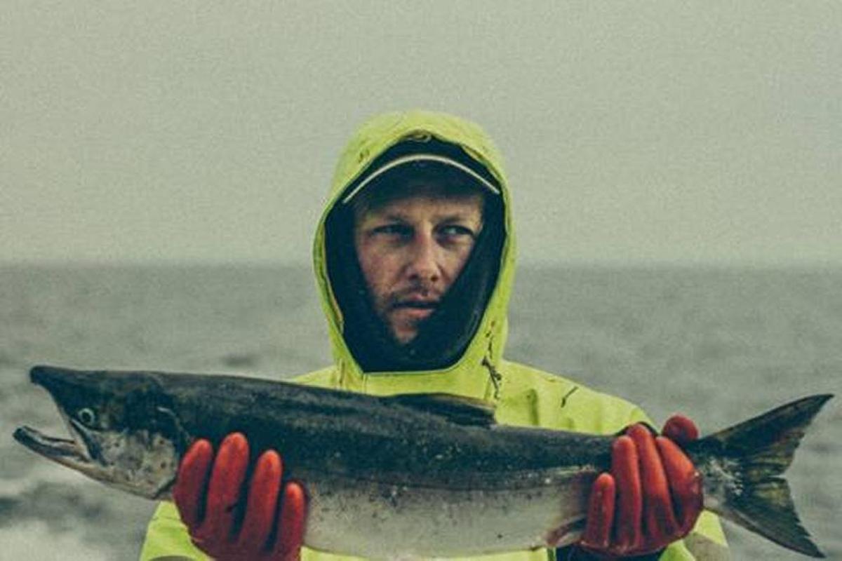 Cambria native Van William holds up a salmon caught during his last summer fishing in Alaska with his father aboard The Shawnee.