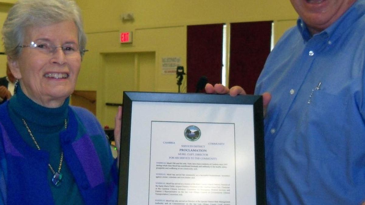 Board President Gail Robinette and former member Muril Clift display a proclamation honoring Clift for his service as a Cambria Community Services District director. Clift stepped down from his post early this month.