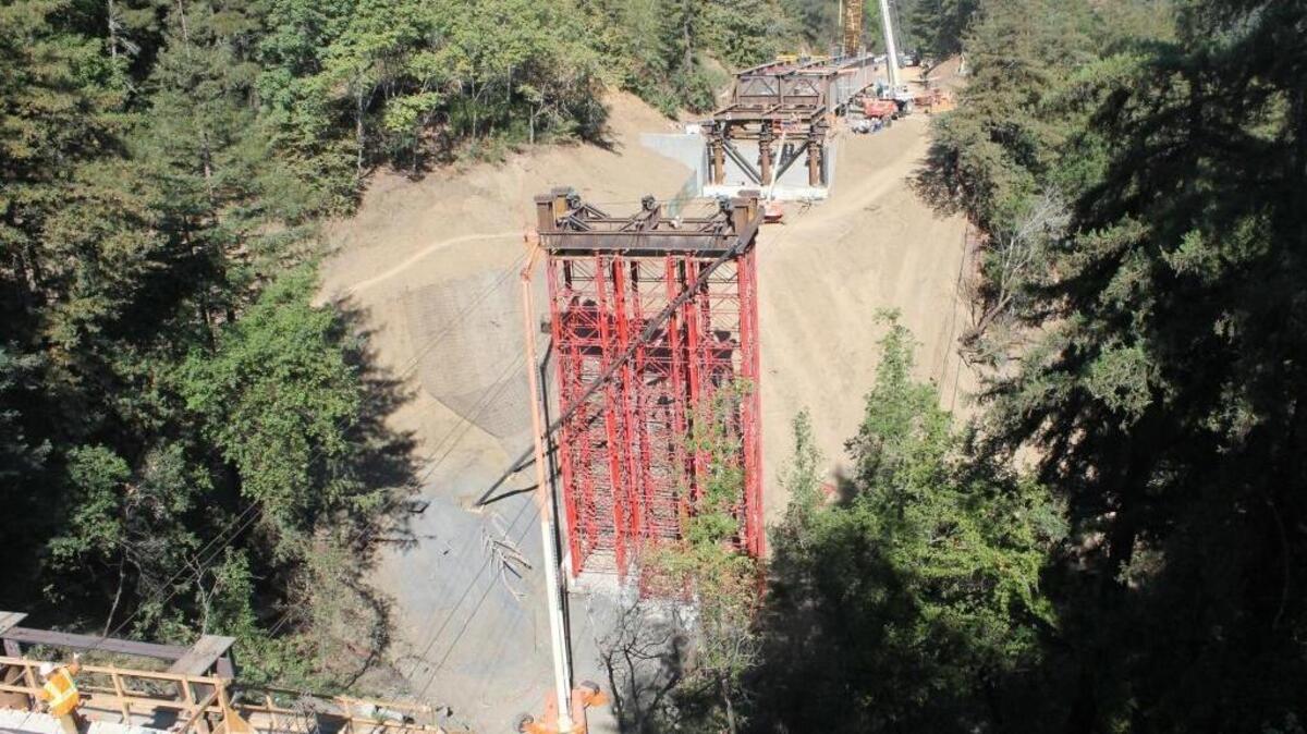 Progress on the new Pfeiffer Canyon Bridge is seen on the morning of Aug. 7.