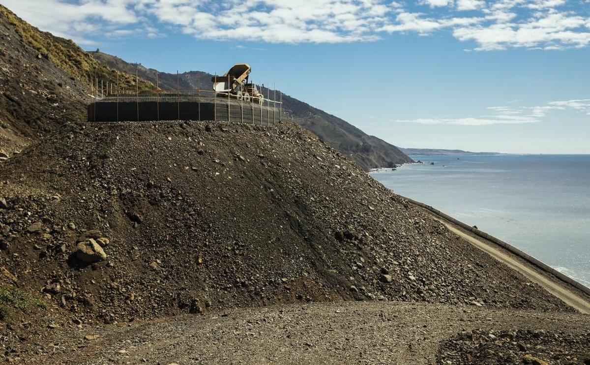 Earthen platforms called baskets are being created to catch rock and debris that continue to fall at the Mud Creek Slide on Highway 1.