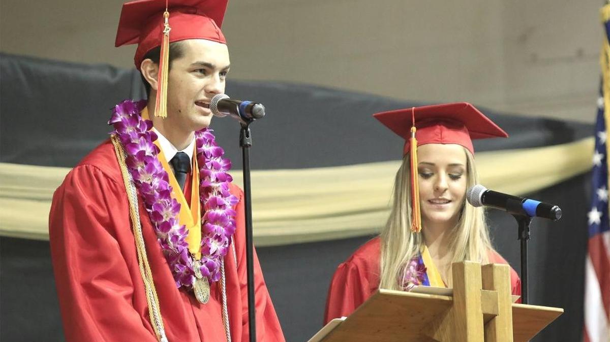 Salutatorians Samuel MacKinnon and Cameryn Tatham speak to their classmates Friday at Coast Union’s graduation ceremony.