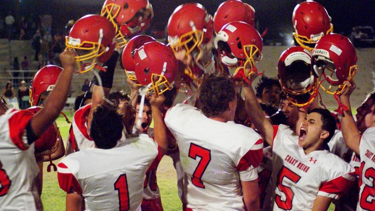 Coast Union players celebrate after winning their first Coast Valley League game, 53-0 over Maricopa. Among those players honored with postseason awards were Emany Plasencia (No. 1), placed on the all-CVL first team; Riley Kennedy (No. 7), Coast’s MVP; Juan Mejia (No. 5), given CVL honorable mention on defense; and Damien Fernandez (No. 42, partially obscured), Coast’s Most Outstanding Offensive Player.