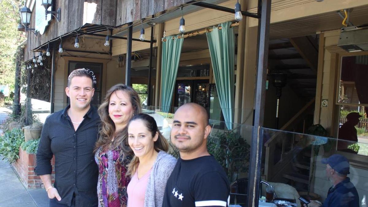 From left, Alex de Alba joins his mother, Berta de Alba, and partners Sarah and Mauricio Lopez, in front of the Cambria Pub & Steakhouse, which is undergoing an expansion under their new ownership and is likely to get a new name.