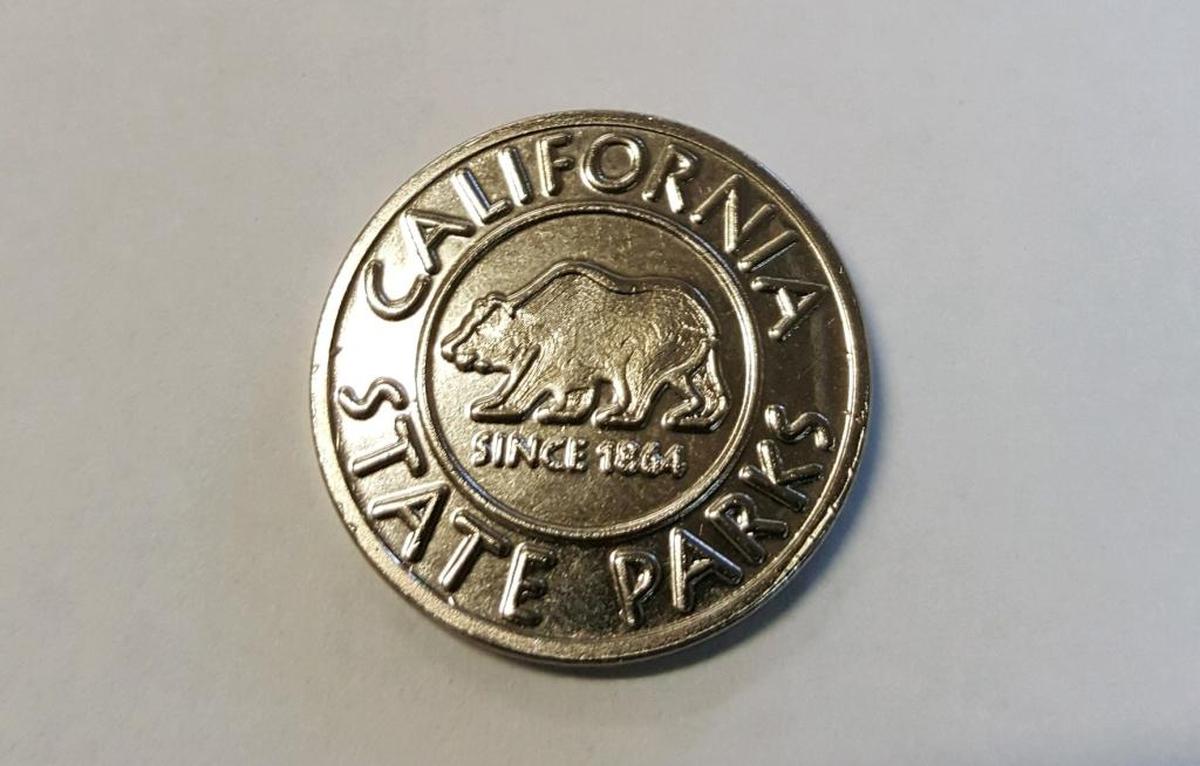 One of the tokens being used to pay for showers at Morro Bay Campground.