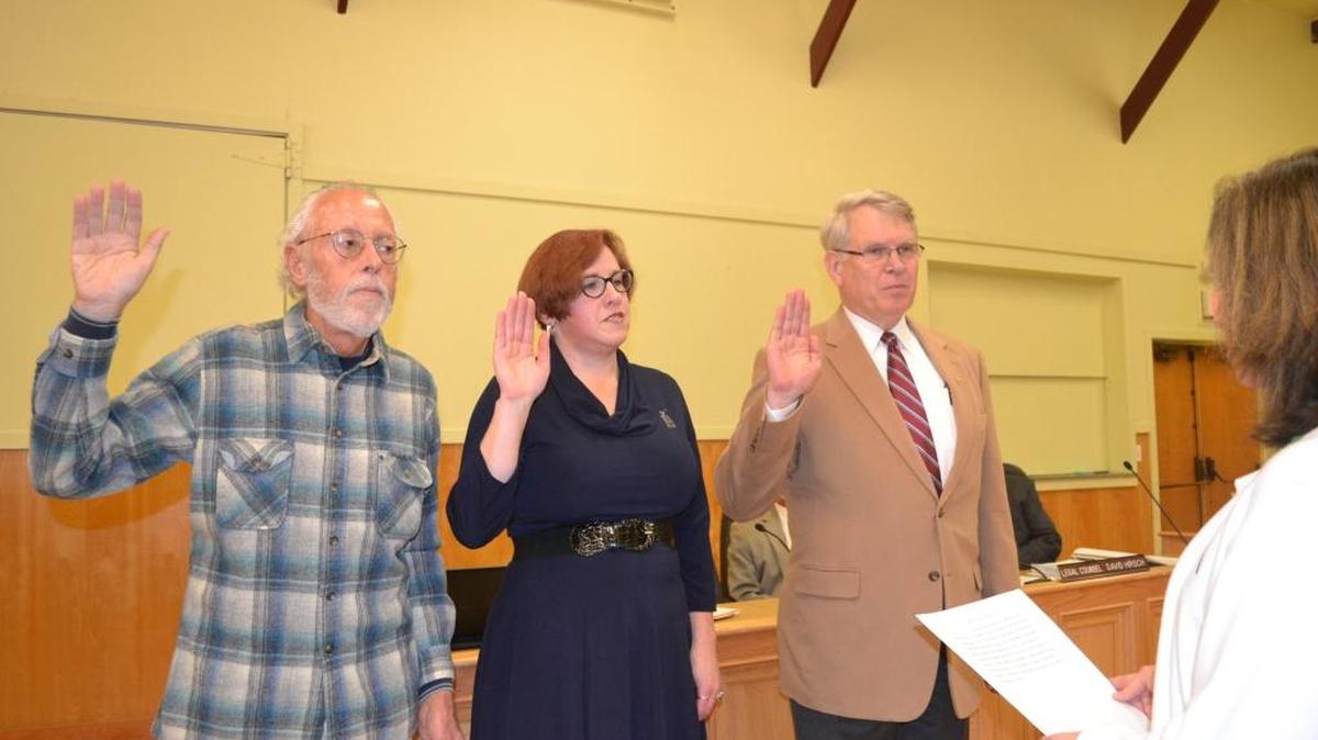 Directors Harry Farmer, Amanda Rice and Greg Sanders, who won three contested seats in the November election, are sworn in at the Dec. 15 meeting of the Cambria Community Services District Board of Directors. Rice and Sanders were returned to the board, where they already held seats, while Farmer is a first-time director. Rice was later voted president of the board.