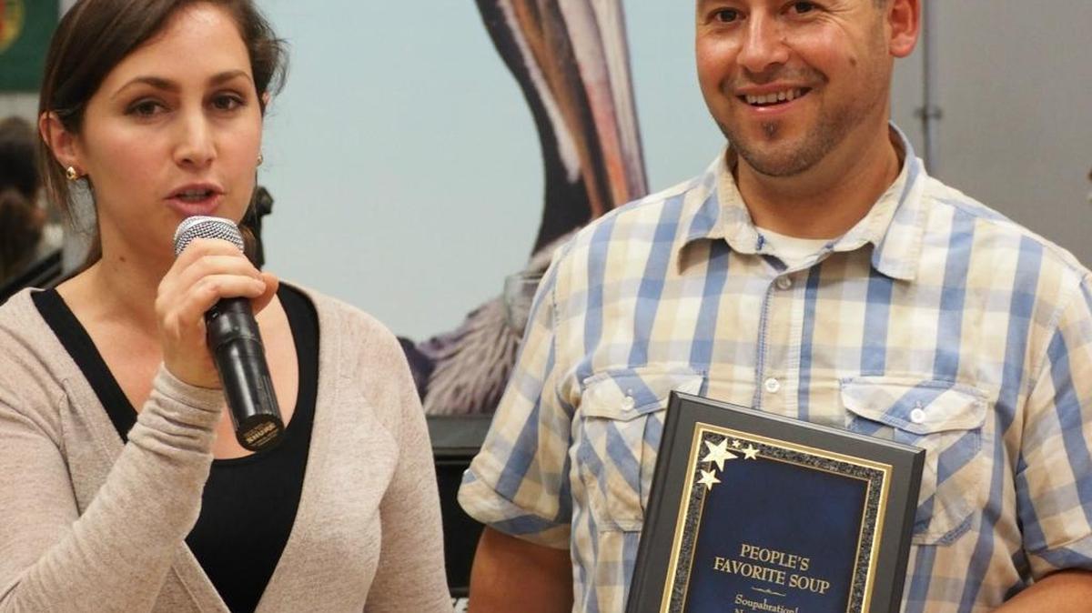 Theresa and Miguel de Alba of Manta Rey Restaurant display the award they won for People’s Favorite Soup.