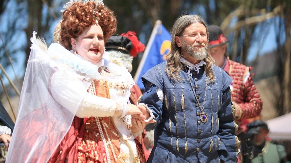 Queen Elizabeth I, played by actress Thena MacArthur, is accompanied by her guards, courtiers and attendants, such as the newly knighted “Sir Winston” (Michael Teubner of San Luis Obispo) during last year’s Central Coast Renaissance Festival.
