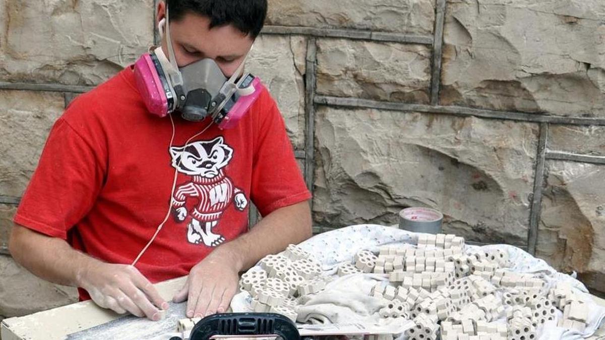 Cuesta College professor Jarred Pfeiffer creates one of his pieces.