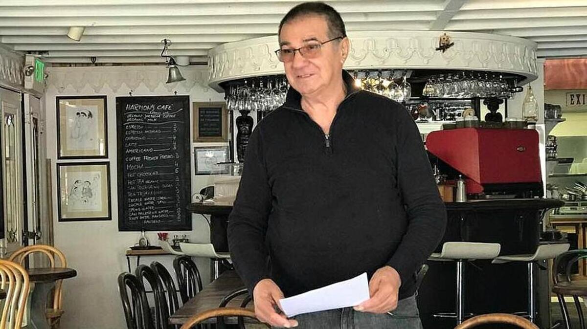 Giovanni Grillenzoni details his plans for the Pewter Plough during an announcement Tuesday at his Harmony Café in Cambria’s West Village.