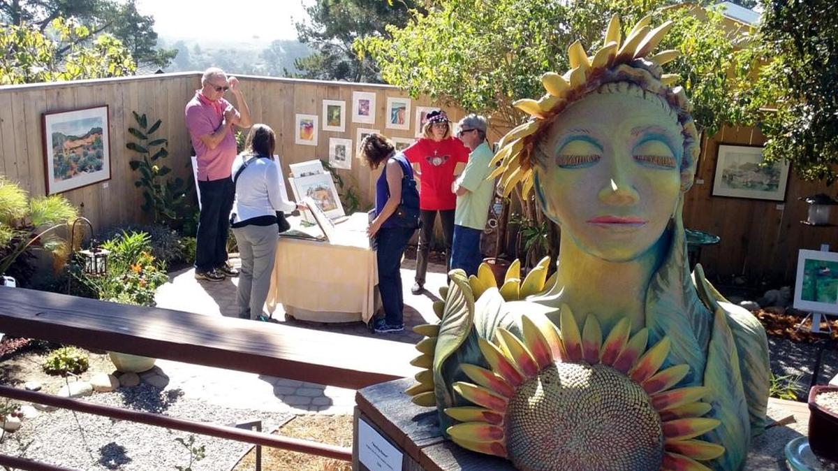 Art lovers browse the Barnhill garden, one of the Cambria stops on this year’s Open Studios Art Tour.