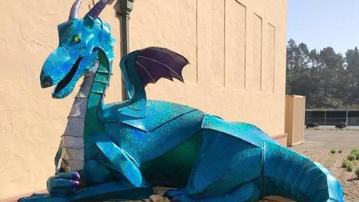 “Puff” stands guard outside the Old Cambria Grammar School. The color dragon created by Ashton Hartley was named Most Imaginative Scarecrow by the judges.