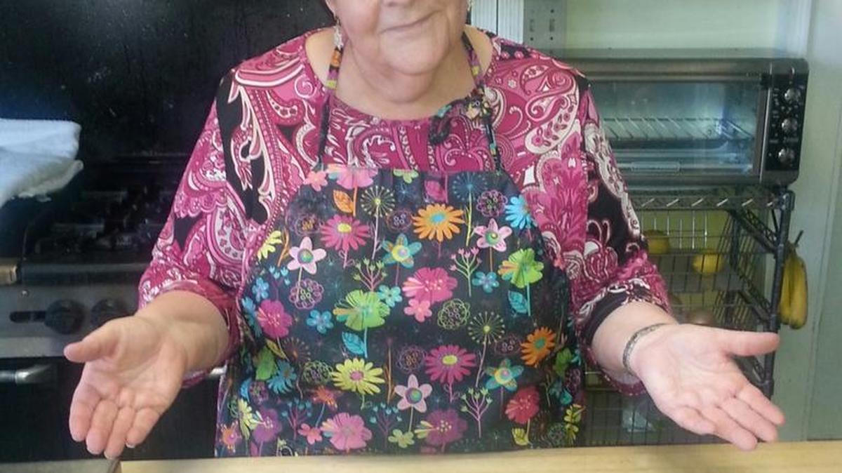 The Culinary Corner bids adieu to Marjorie Ott, as last Monday, Dec. 14, she completed many years of cooking demonstrations and luncheons for us at the Olallieberry Inn. Here she manages several food items at once, proofing bread and roasting smashed redskin potatoes. We all will miss her.