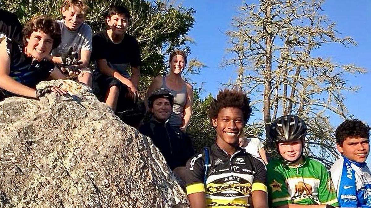 From left, Alexander Burton-Linn, John Mettier, Julio Gomez, Kaley Nye, Stephanie Nye, Anhase Martin, Henry Wright and Emiliano Pena are part of Aaron Linn’s bike program for youth.