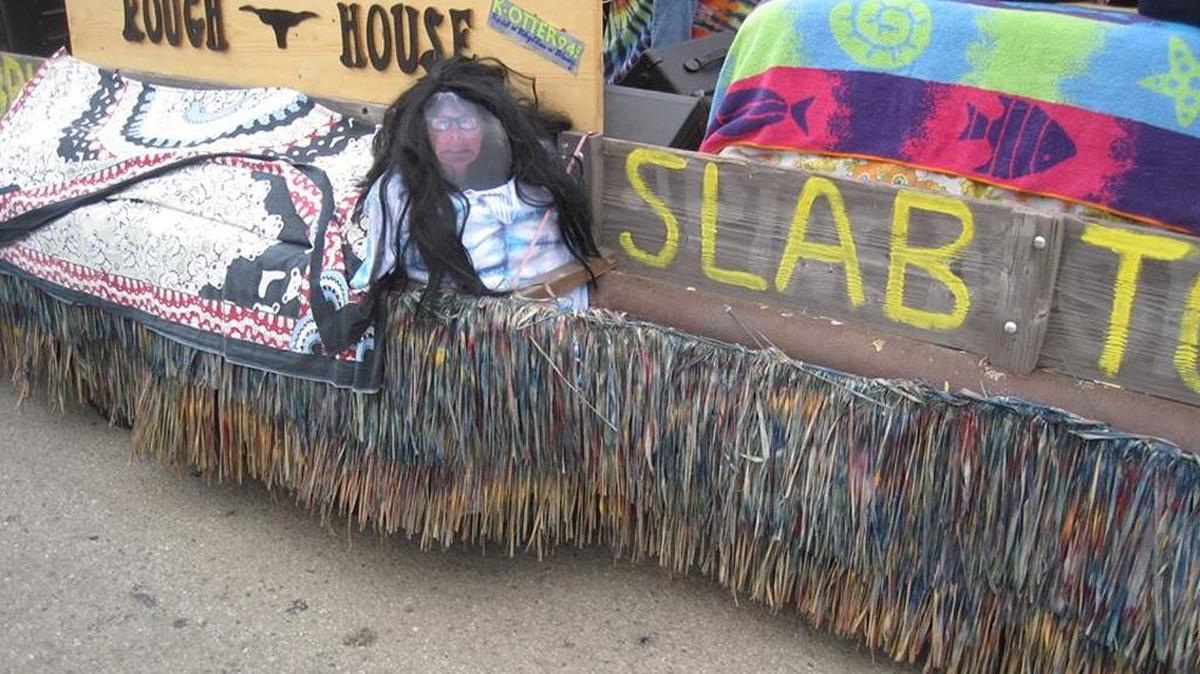 The columnist appears in effigy on the Rough House Band float in the 2016 Pinedorado Parade.