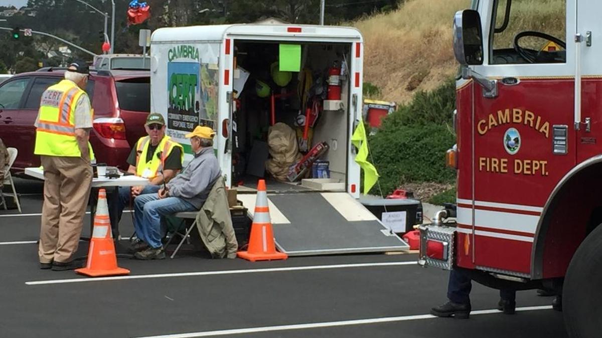 Cambria CERT representatives provide information at the Fire Safe Fair last month in the Santa Rosa Catholic Church parking lot on Main Street.