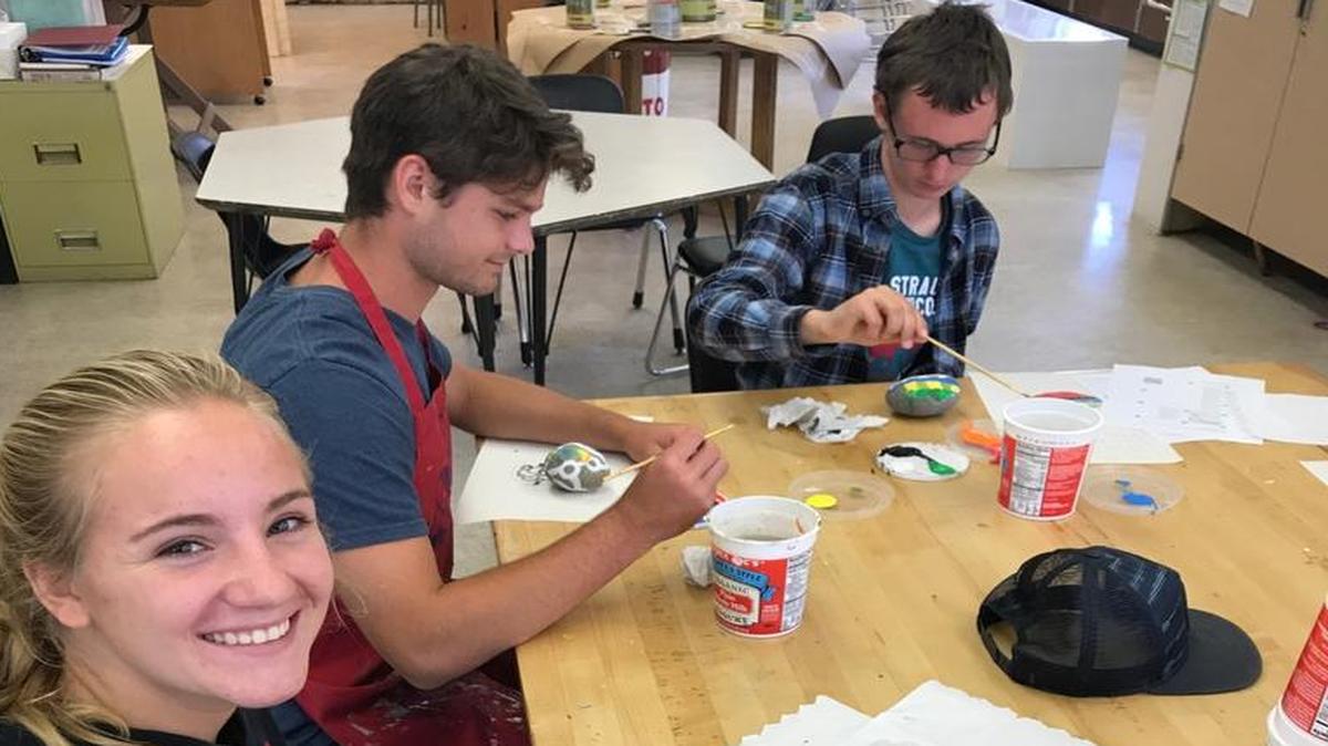 Ellie Kennedy, Zack Azevedo and Luke Fisher work on their rock garden projects.
