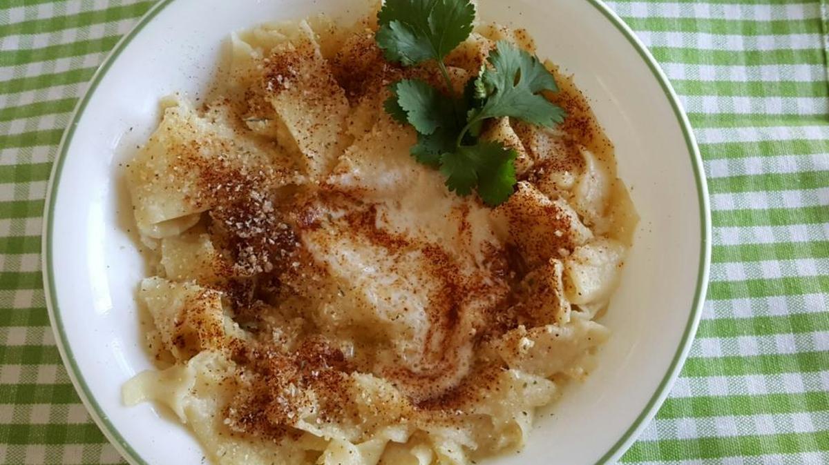 Fresh noodles simmered in chicken broth, dressed with lemon olive oil and a knob of butter and Parmesan cheese.