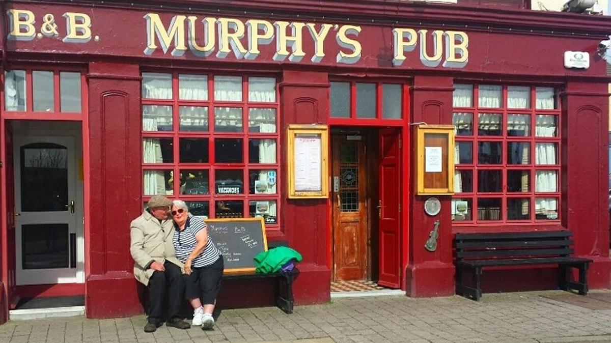 When in Ireland, do as the Irish do. Enjoy a hearty meal in a traditional pub, and engage with the locals.