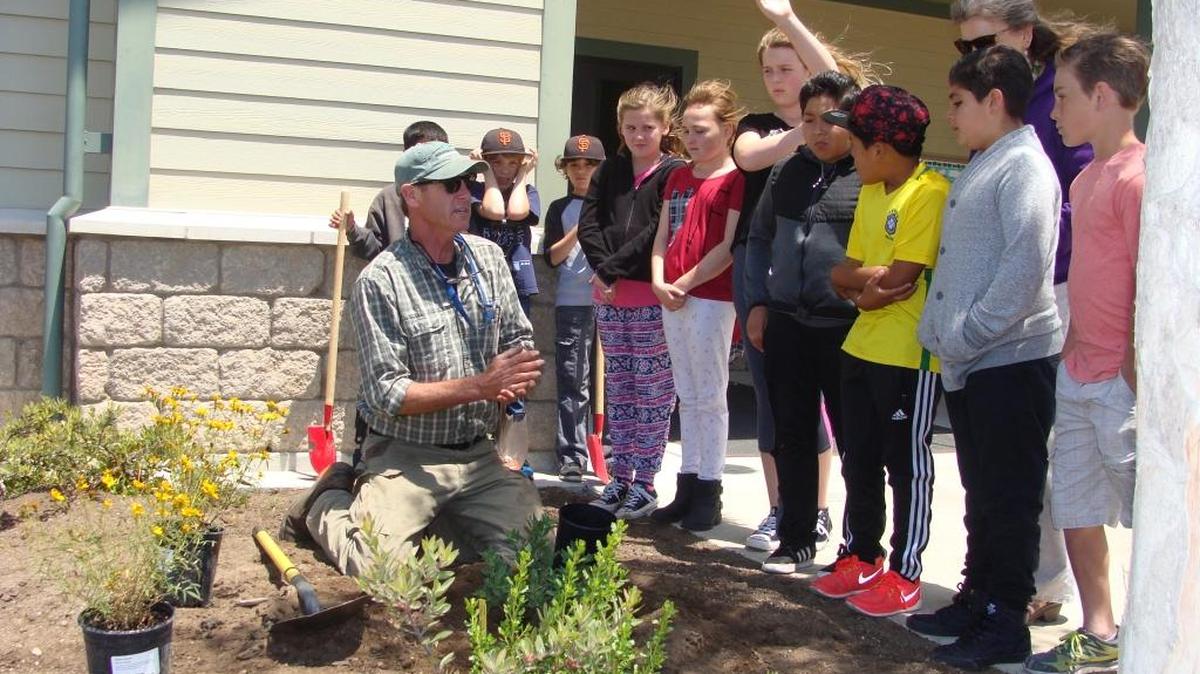 David Bidwell gave a presentation to 12 fifth-grade students who helped plant a peace garden at Cambria Grammar School.