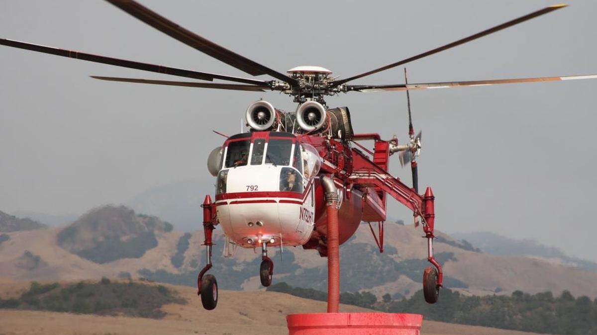 A helicopter prepares to fight the Chimney Fire on Hearst Ranch late last month.