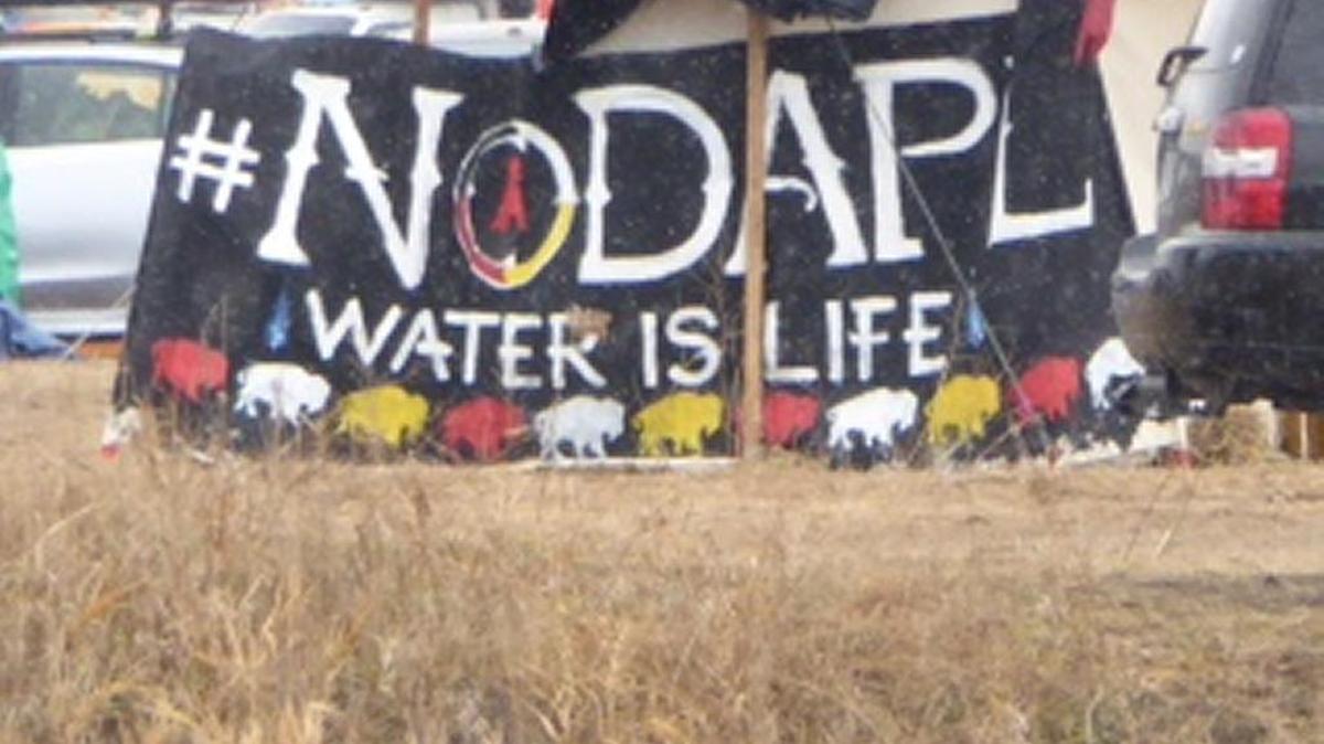 Cambrians Jane and Doug Hay participated in the Standing Rock Sioux protest against an oil pipeline proposal last month. This photo shows one of the public messages at the encampment.