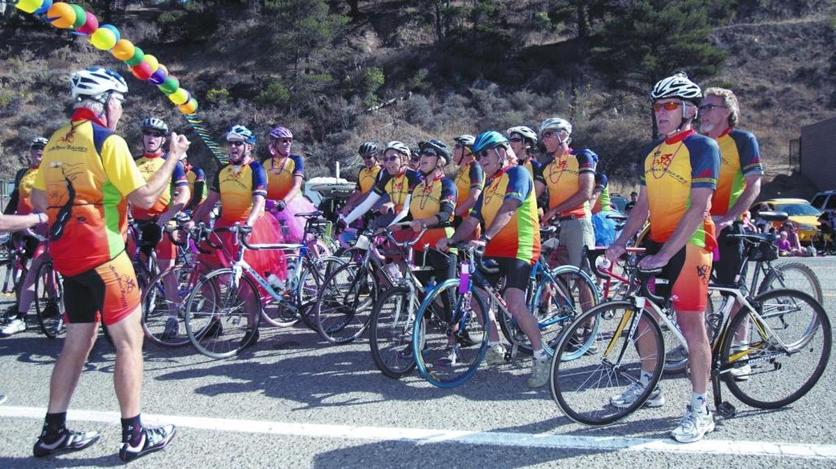 The Slabtown Rollers Cycling Club serenade the judges at the 2014 Pinedorado Parade.