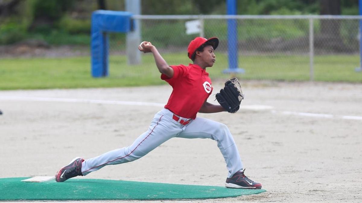 Anhase Martin delivers a pitch for the Cambria Reds.