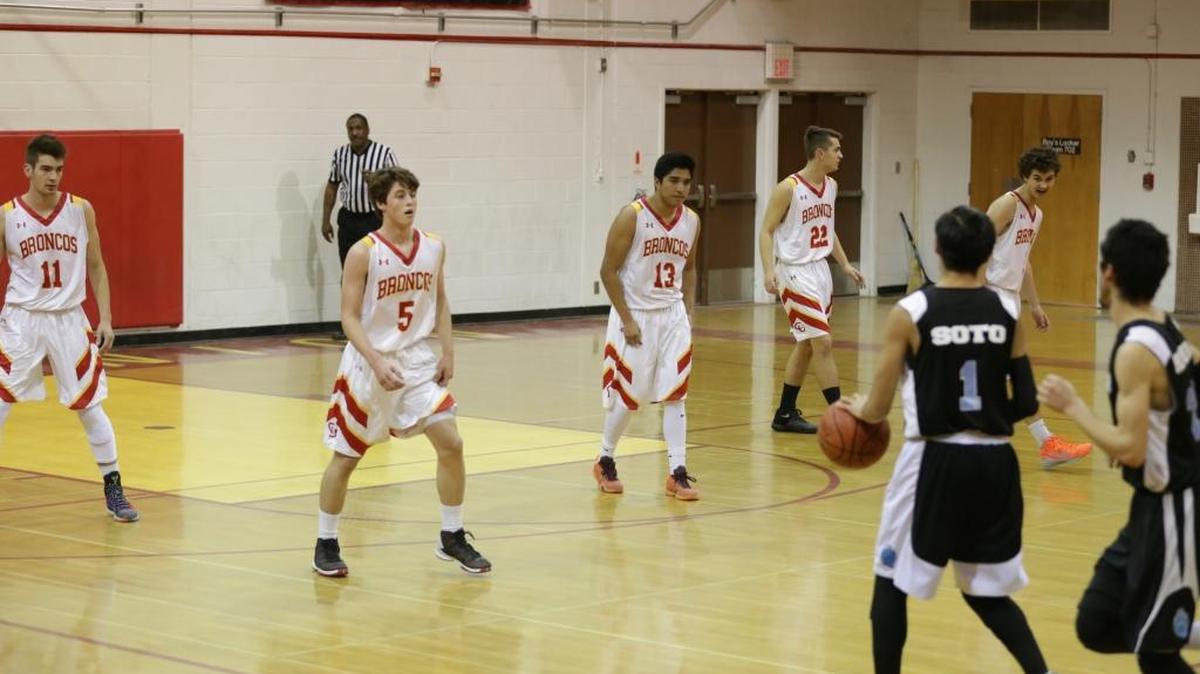 Coach Tim May has the Broncos playing tight, tough defense. Here the team (left to right, Jez Lawson, Auggie Johnson, Roberto Cueva, Sam MacKinnon and Jack MacKinnon) gets back on defense ahead of Cuyama Valley on Jan. 27.