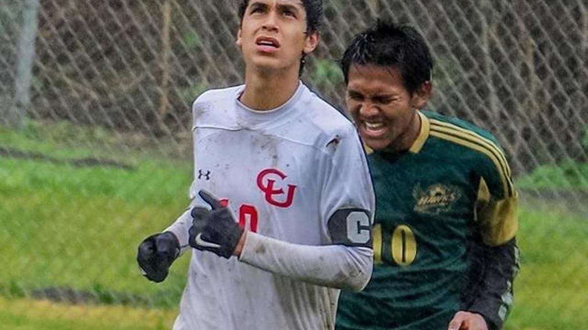 Former Bronco Ricky Abitia (class of 2016) scored one of the seven alumni goals against the Bronco varsity squad on Friday, Dec. 30. Here, he competes on a rainy day in 2016.