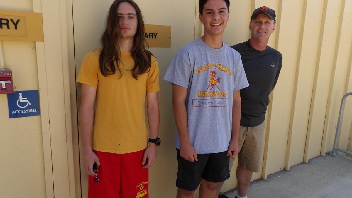 Coast Union cross country runners Paul Butterfield, left, and David May, with coach Ayen Johnson, prepare for a July 7 run on Santa Rosa Creek Road.