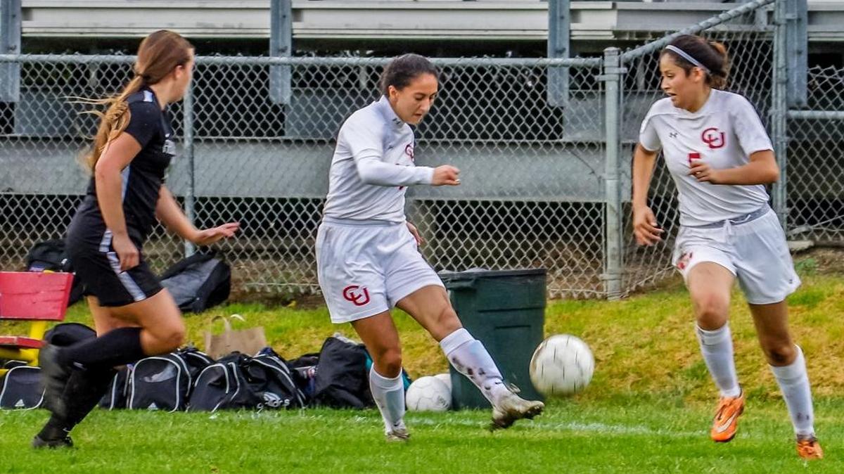 Junior Martha Gomez-Mora, center, scored the only two goals for Coast Union against Fresno Christian on Friday, Jan. 5. Coast lost, 3-2. Pictured near Martha is senior Ashley Colin, No. 5.