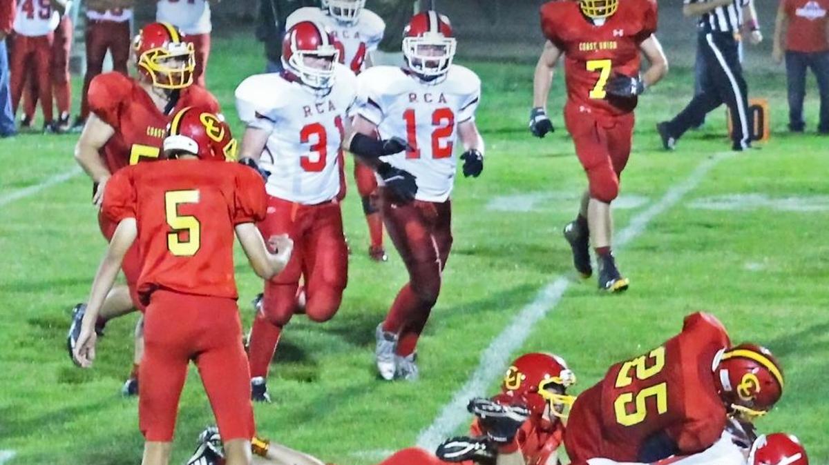 Jack MacKinnon and Lane Sutherland each had nine tackles in Coast Union’s 45-24 football win over Maricopa on Oct. 23. Here, Sutherland (No. 25) tackles a Riverdale Christian Academy player earlier in the season. Roberto Quintero (No. 5) and Warren Smith (No. 7) look on.