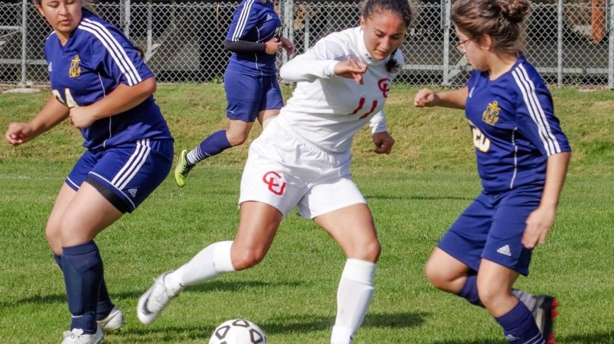 Junior Martha Gomez-Mora scored both goals in Coast Union’s 2-1 win over Marina on Saturday Dec. 2. Here she battles for ball control during that game.