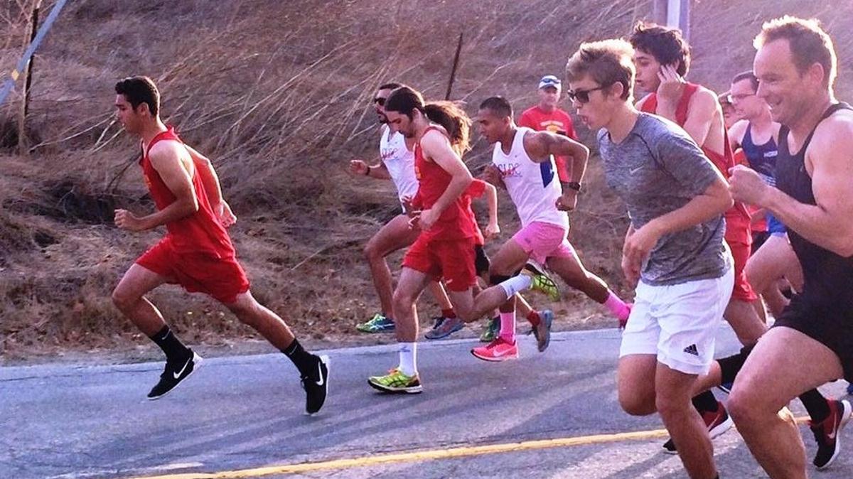 Coast Union High School cross country runner David Amodei, left, participates in the AFS-Pinedorado 5K in 2017.